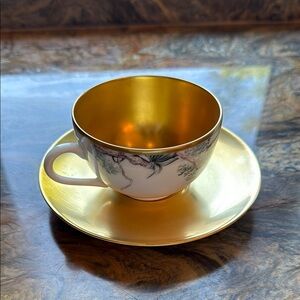 Hermes Gold and White Teacup and Saucer Set